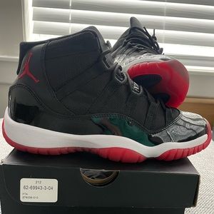 Like New Jordan Retro Bred 11’s size 5.5Y.